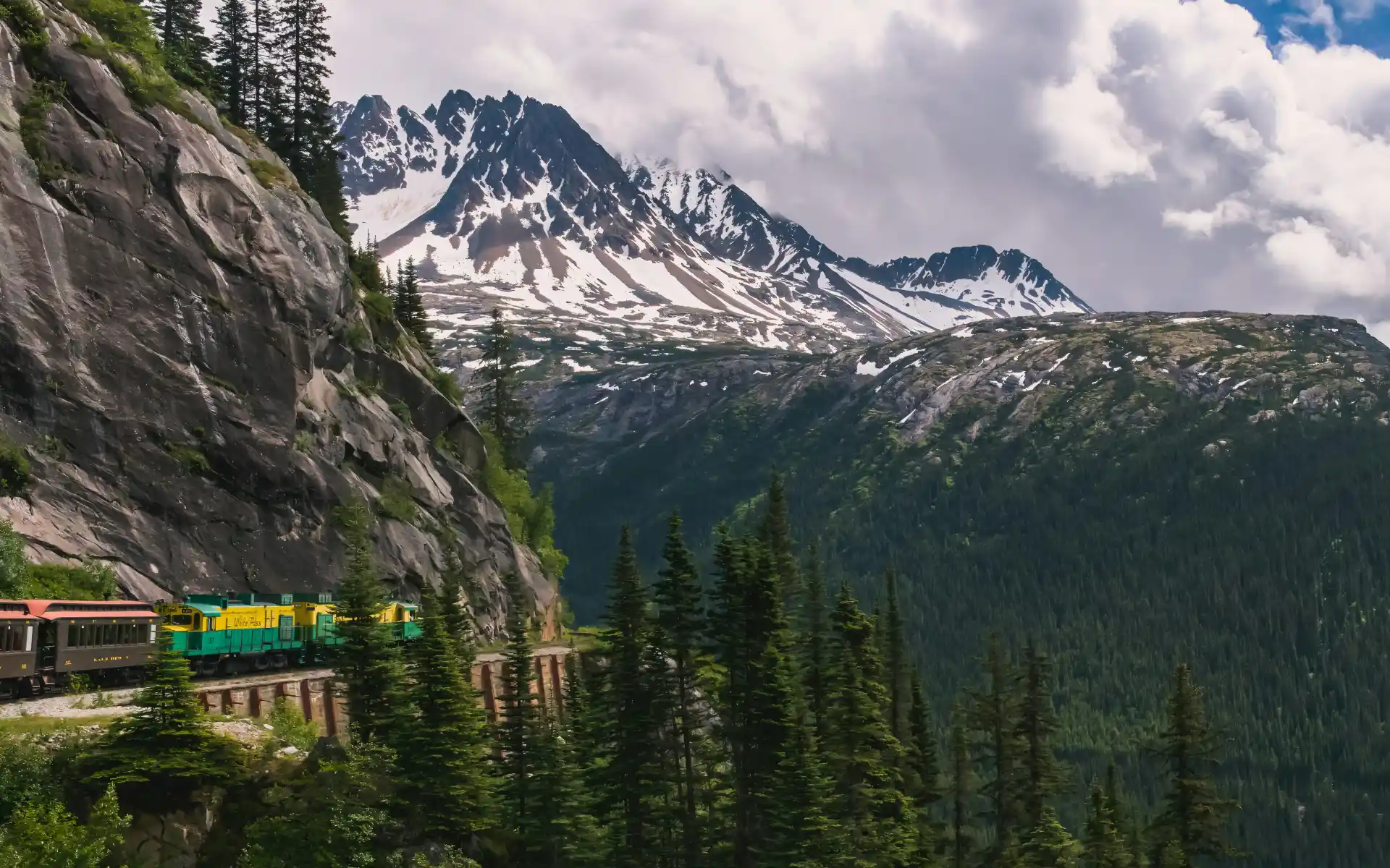 The White Pass & Yukon train drives through the mountains in Alaska/Yukon